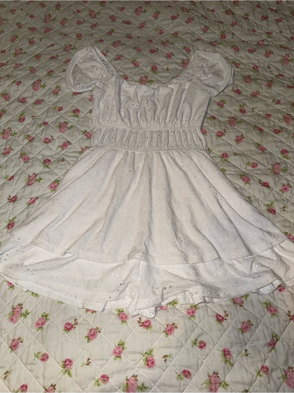 Rue 21 white eyelet romper dress with puffy sleeves and ruffle hem. Size M